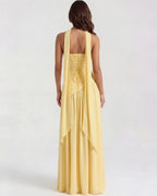 Vestido maxi amarillo con abertura lateral