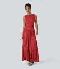 Vestido maxi fluido canalé, escote barco, tirante asimétrico, fruncido lateral, bolsillos
