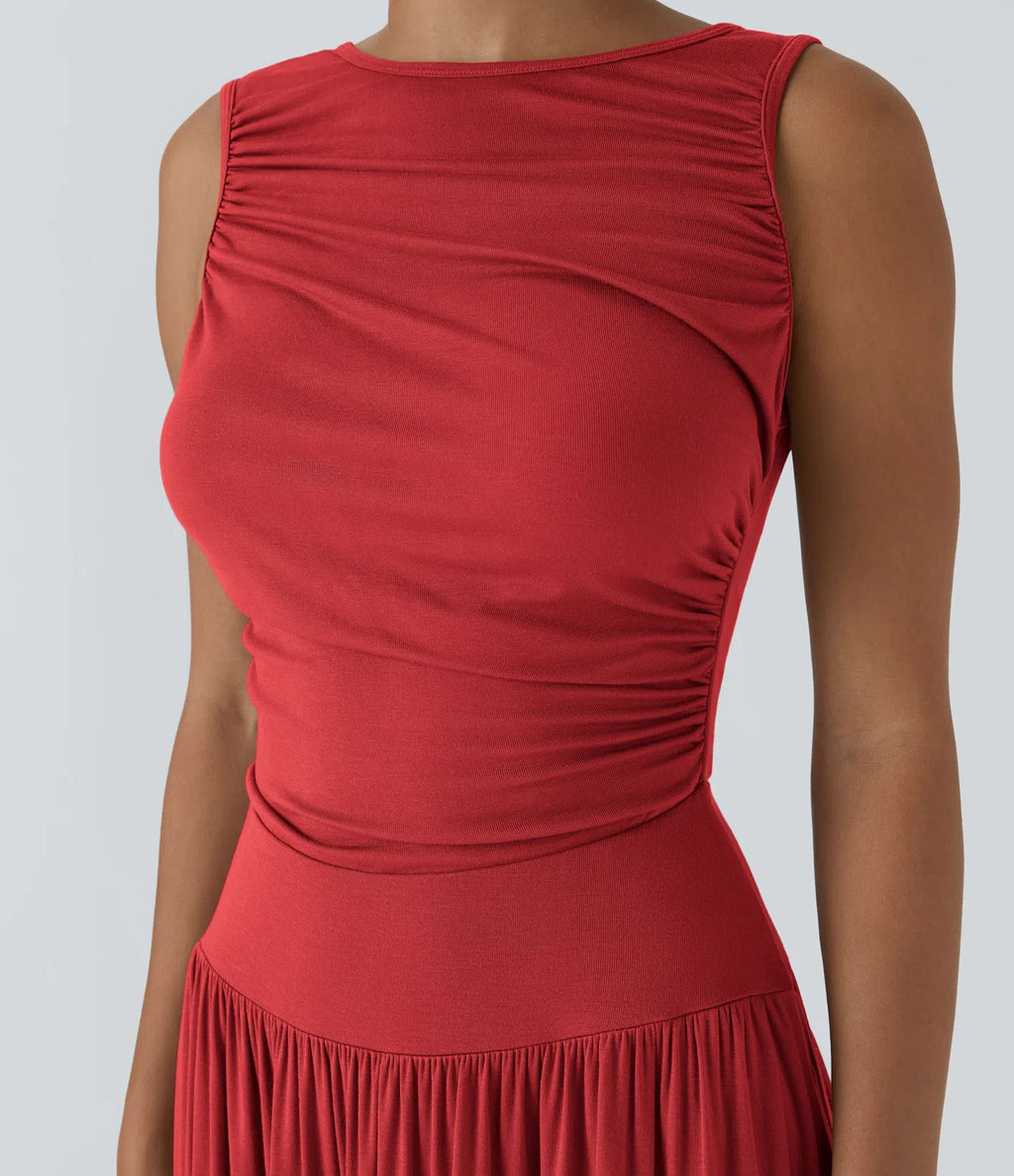 Vestido maxi fluido canalé, escote barco, tirante asimétrico, fruncido lateral, bolsillos