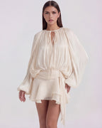 Vestido mini blanco boho con manga abullonada