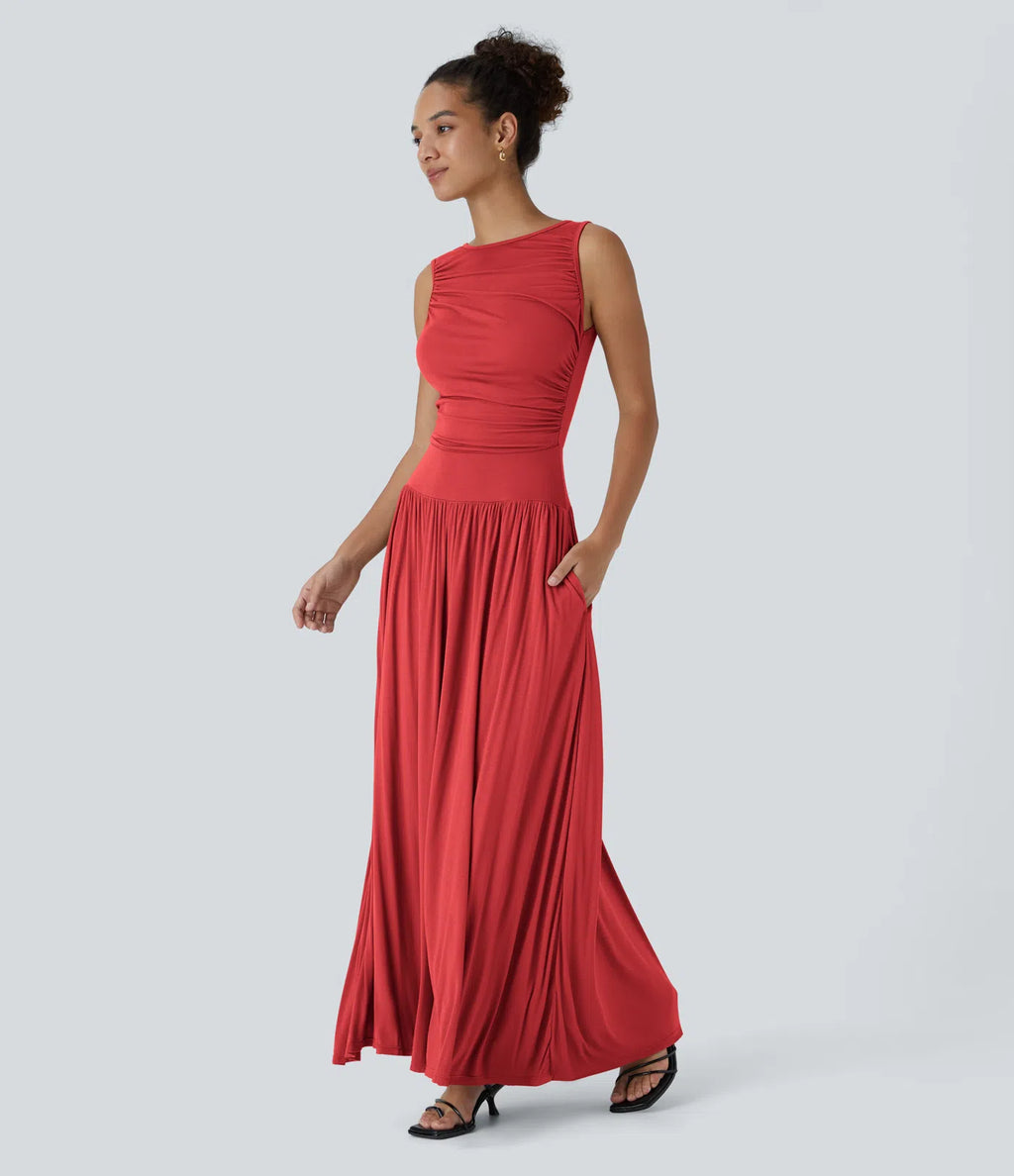 Vestido maxi fluido canalé, escote barco, tirante asimétrico, fruncido lateral, bolsillos